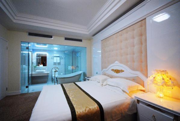 Peach Blossom Castle Hotel Sanghaj Szoba fotó
